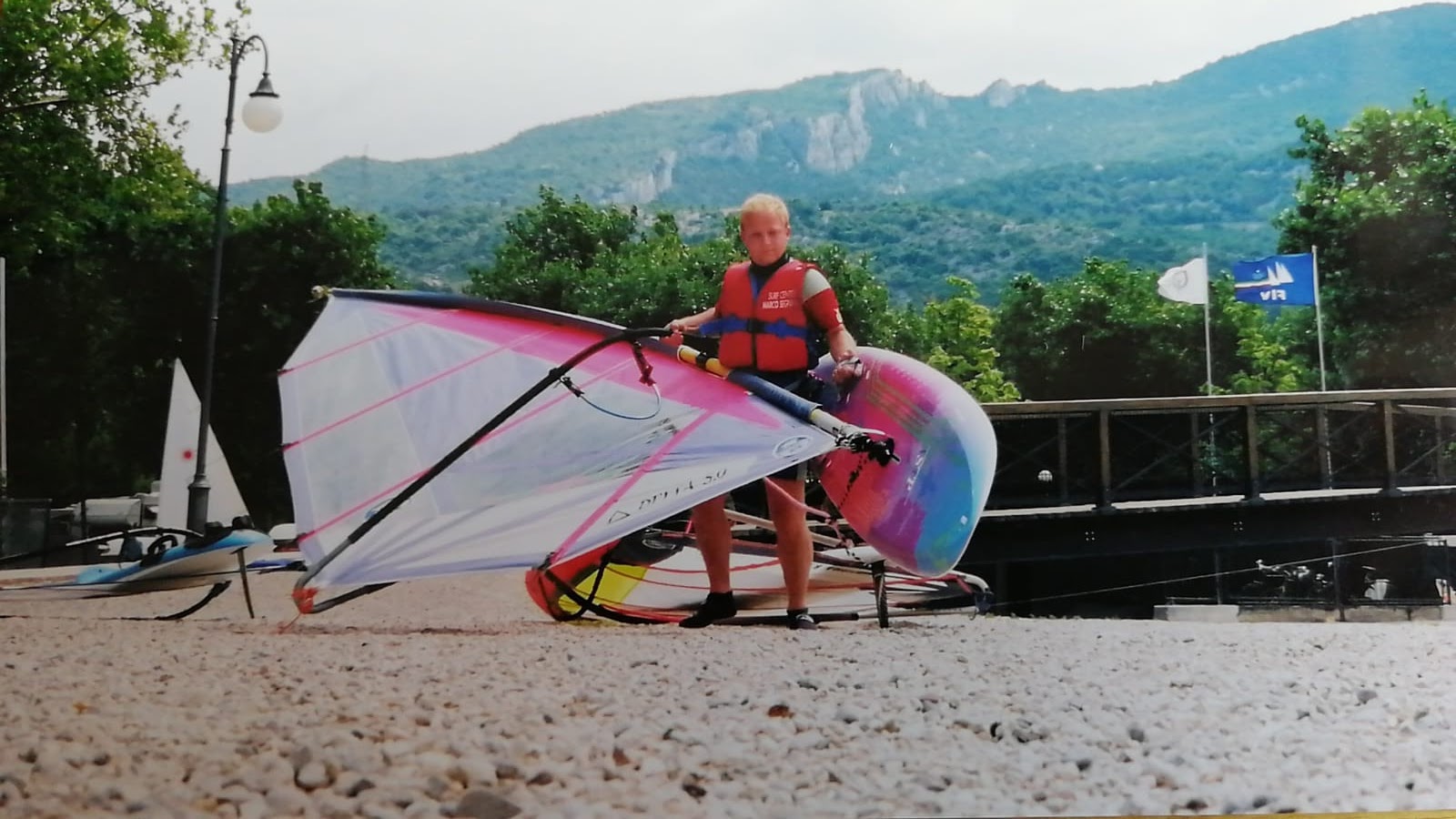 Windsurfing with a colourful sail — many years ago